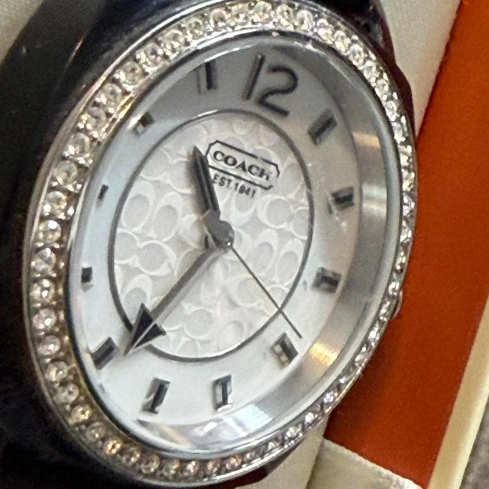 Coach Black Band Watch. Rhinestones around the face‎